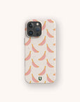 The Pink Bananas Eco-Friendly Phone Case for iPhone and Samsung Galaxy features a playful pink and yellow banana pattern on beige, with a small green "U" logo at the bottom, all on a minimal, biodegradable design.