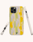 The Lime Sorbet Eco-Friendly Phone Case is biodegradable and vegan, featuring an abstract pastel pattern with yellow, green, and lavender brushstrokes, shown from the back and sides against a light background.