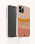 A smartphone with the Valleys Eco-Friendly Phone Case, showcasing a beige speckled design with layered, wavy bands in pink, orange, and yellow tones. The phone’s camera and screen are visible.