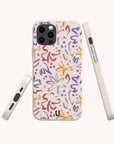 Three views of a smartphone featuring the Flower Strokes Eco-Friendly Phone Case in a white finish, adorned with vibrant orange, purple, and red abstract floral patterns. The sustainable case also includes a small green logo at the bottom.