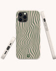 The Green Distorted Lines Eco-Friendly Phone Case, made with sustainable materials, features an abstract wavy green and beige pattern and is shown from back, side, and bottom angles. Compatible with iPhone and Samsung Galaxy models against a plain background.
