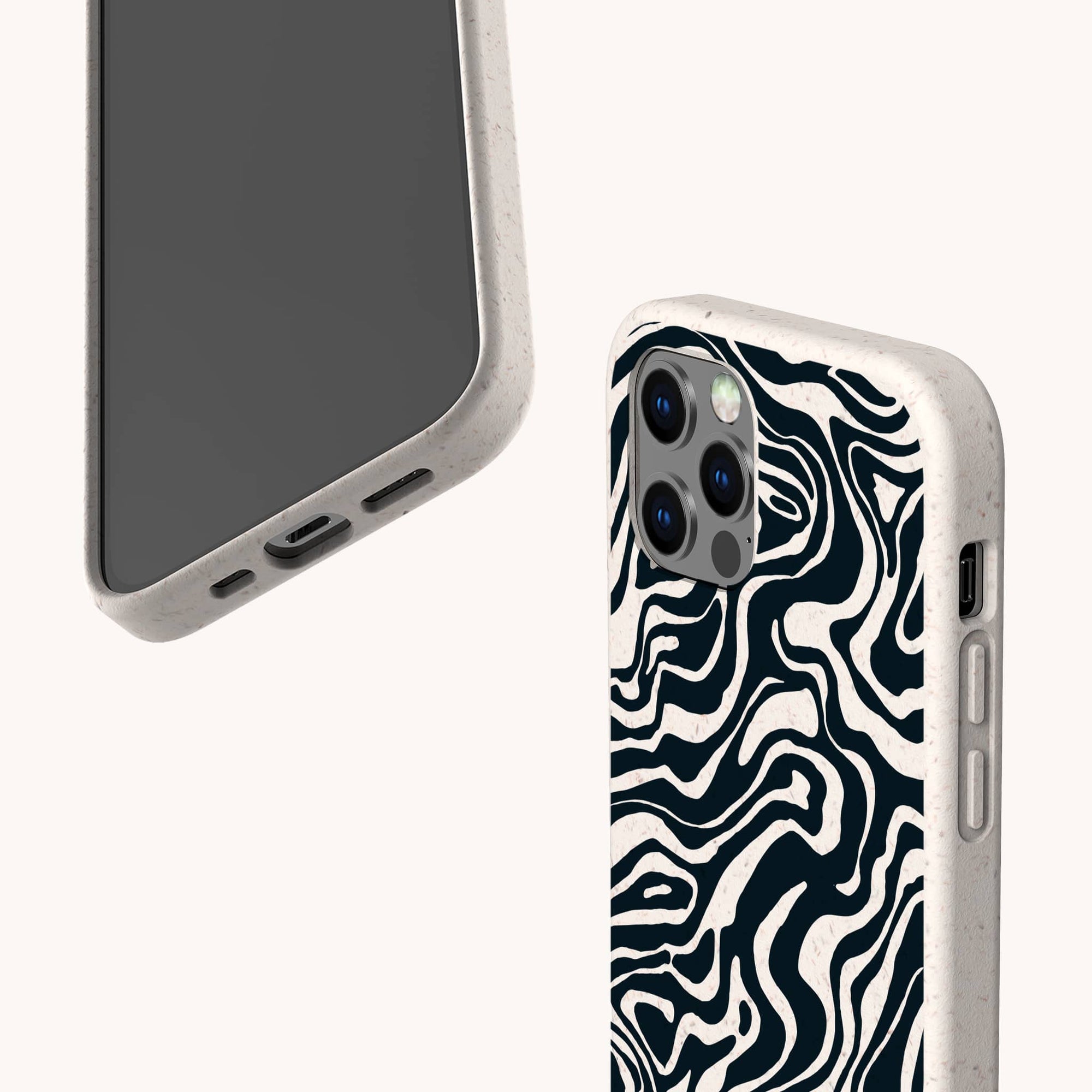 Two smartphones with beige speckled, compostable cases—one displaying the Black Marble Swirl Eco-Friendly Phone Case, and the other showing its front and bottom edge against a light background.