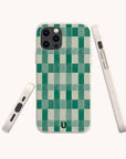 The Green Watercolour Checker Eco-Friendly Phone Case, featuring a green and off-white checkerboard design, is shown on a smartphone from the back, side, and bottom against a white background. Compatible with iPhone and Samsung Galaxy.