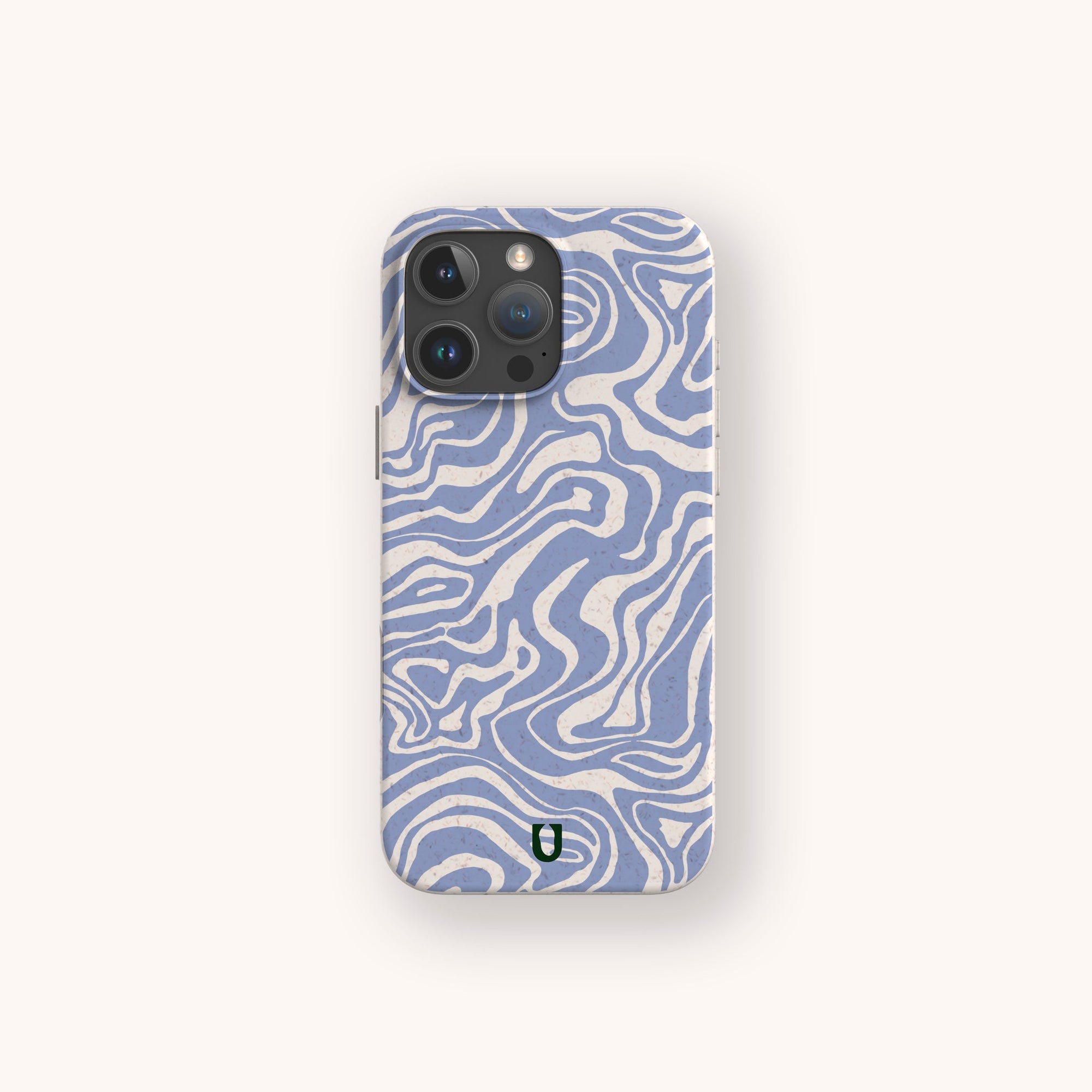 A smartphone displays the Blue Marble Swirl Eco-Friendly Phone Case, featuring swirling blue and white with a green and black logo near the bottom center, set against a plain, light background.