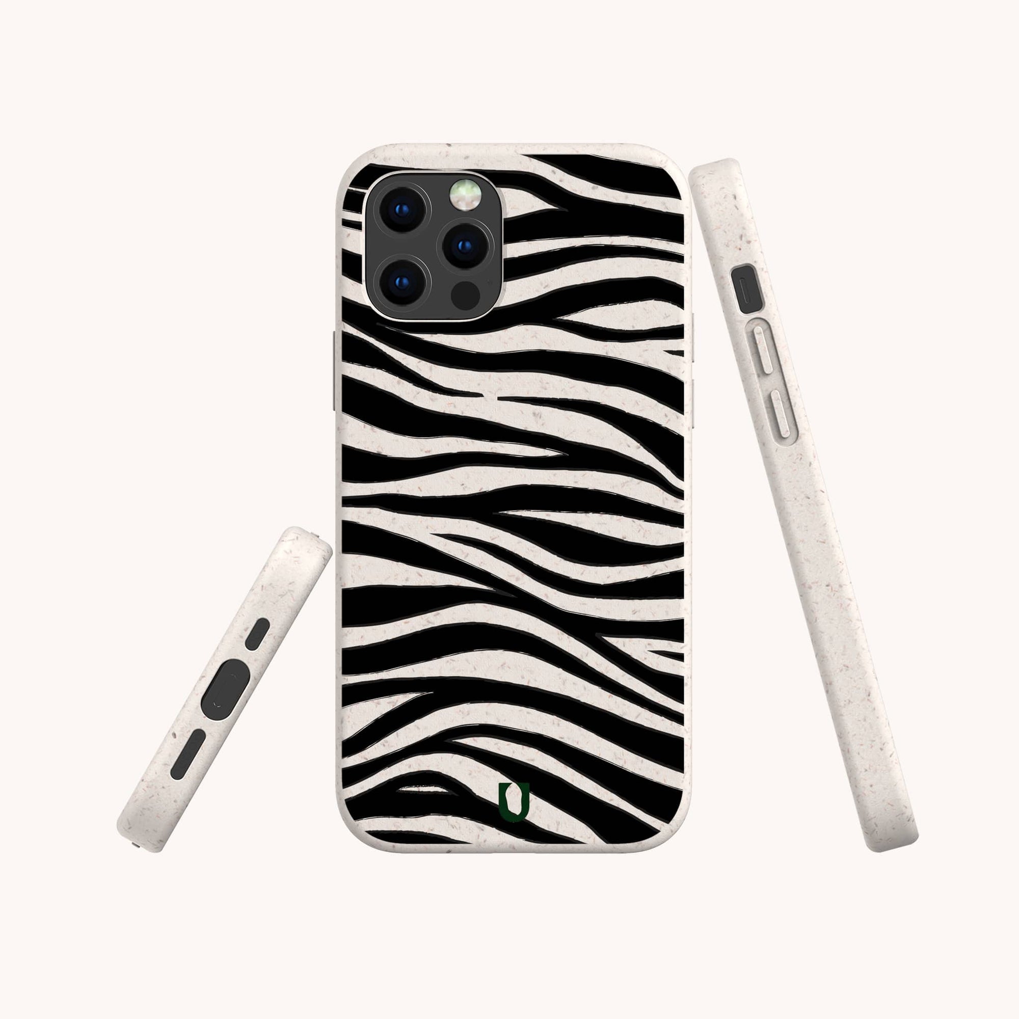 The Zebra Eco-Friendly Phone Case features a black and white zebra stripe pattern, is made from compostable biodegradable materials, and has precise cutouts for the camera and buttons. Shown from the back and sides against a light background.
