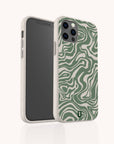 Two smartphones with beige, eco-friendly Green Marble Swirl Eco-Friendly Phone Cases—one displaying the front screen and the other showcasing the back with a green and white wavy, abstract pattern reminiscent of green marble. The camera lenses and buttons are clearly visible.