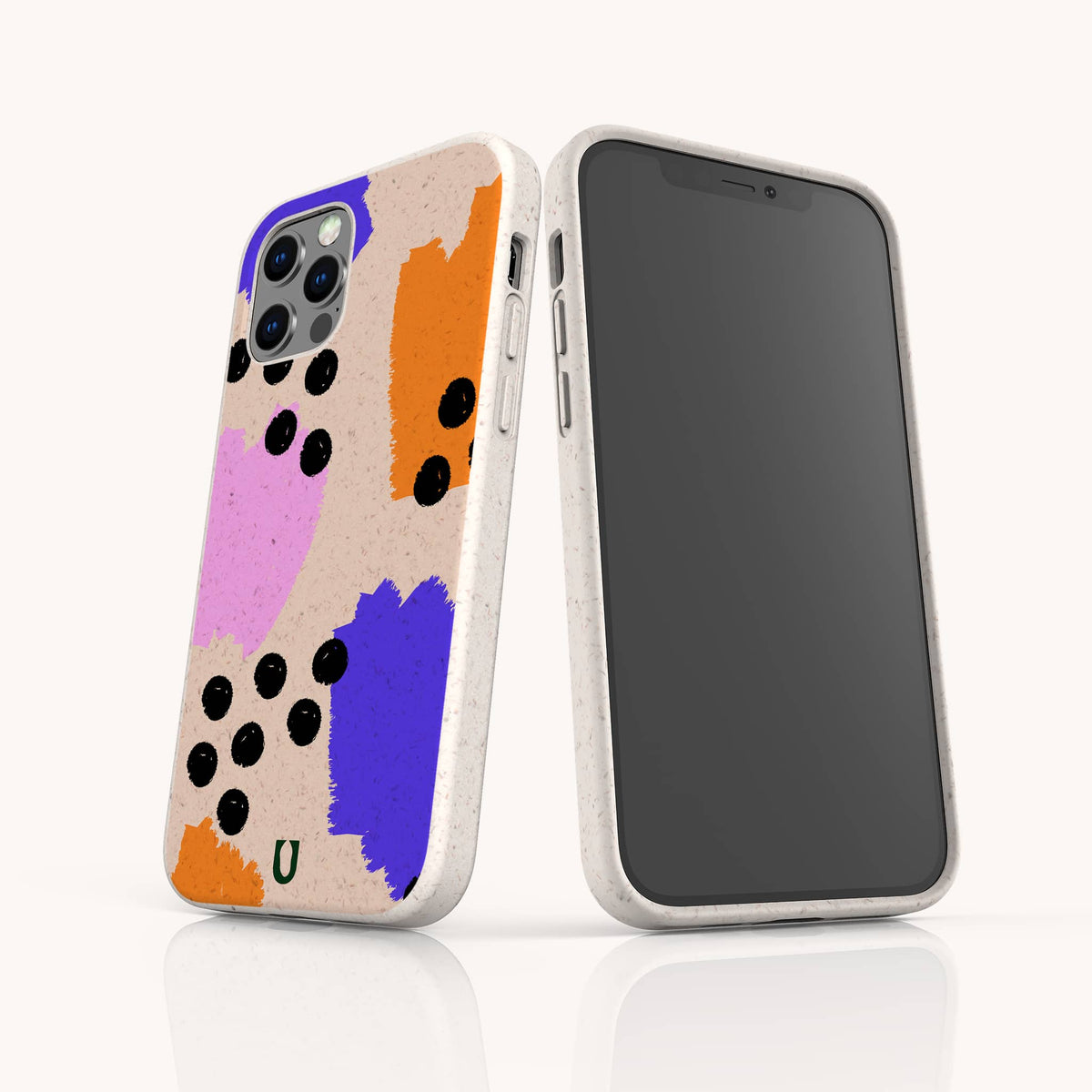 Two Memphis Eco-Friendly Biodegradable Phone Cases in white with abstract, colorful designs—featuring orange, purple, pink, and black paint-like spots reminiscent of the iconic Memphis style—are displayed from both the front and back on a white background.