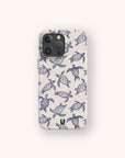 Introducing the Turtles Eco-Friendly Phone Case—a stylish phone case adorned with blue sea turtle patterns on a light background, thoughtfully crafted from sustainable materials for an environmentally conscious choice.