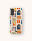 Introducing the Monkey See Monkey Do Eco-Friendly Biodegradable Phone Case—a plastic-free phone case decorated with a vibrant grid pattern of palm trees, animals, and decorative frames in orange, blue, yellow, and green on a light background. This stylish biodegradable case blends bold design with sustainability for an eco-conscious choice.