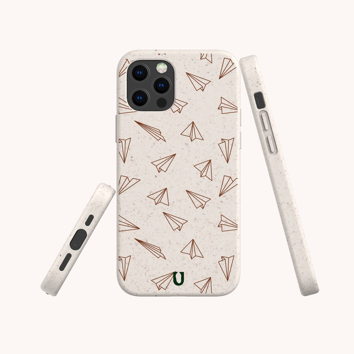 Three views of the White Paper Planes Eco-Friendly Biodegradable Phone Case—a minimalist beige case featuring a brown paper airplane pattern and a small green horseshoe at the bottom—shown from the back, side, and bottom angles.