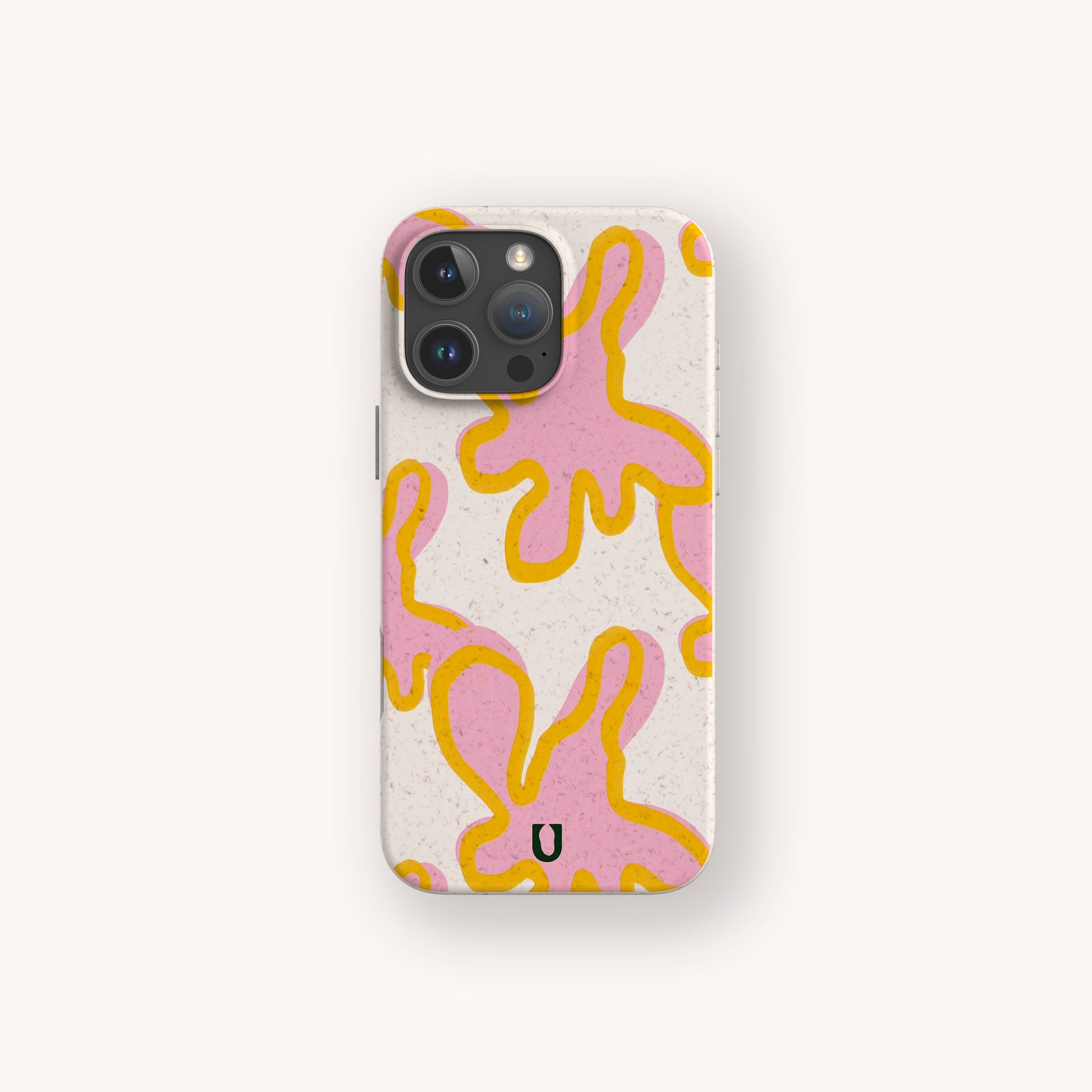 The Pink Abstract Flowers Eco-Friendly Phone Case is a white, biodegradable case with abstract pink shapes outlined in yellow and a small black "U" near the bottom center, shown against a light background.