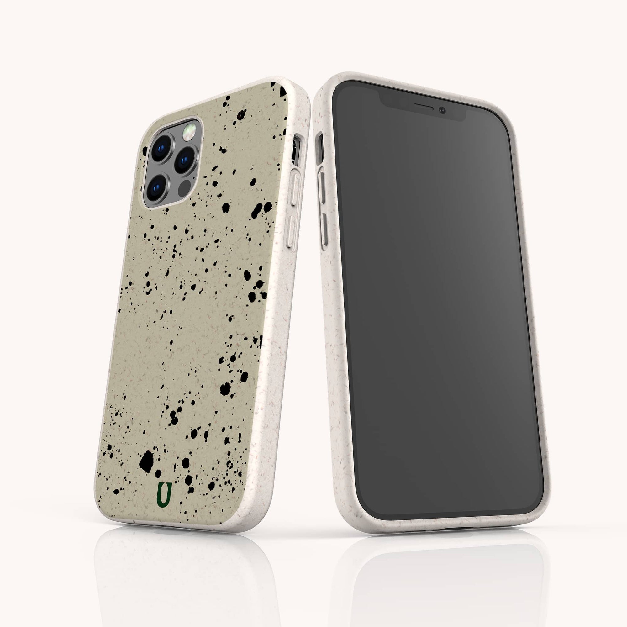 Two smartphones in off-white Grunge Eco-Friendly Phone Cases featuring urban patterns and black paint splatters. One shows the triple-camera back with a green logo; the other displays the blank front. Durable, lightweight, and eco-friendly.