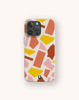 Introducing the Paper Scraps Eco-Friendly Biodegradable Phone Case—a stylish smartphone case featuring an abstract terrazzo pattern with pink, yellow, and orange shapes on a light background, thoughtfully designed for those who value both sustainability and modern design.