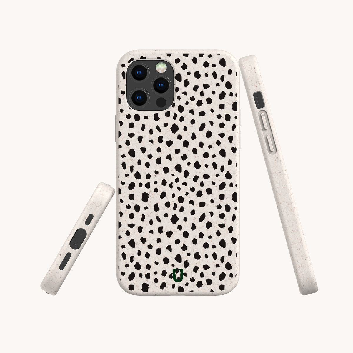 Three views of the Dark Spots Eco-Friendly Phone Case for iPhone and Samsung Galaxy, featuring a minimalist white design with black irregular spots in a dalmatian pattern, displayed from the back, side, and bottom against a plain light background.