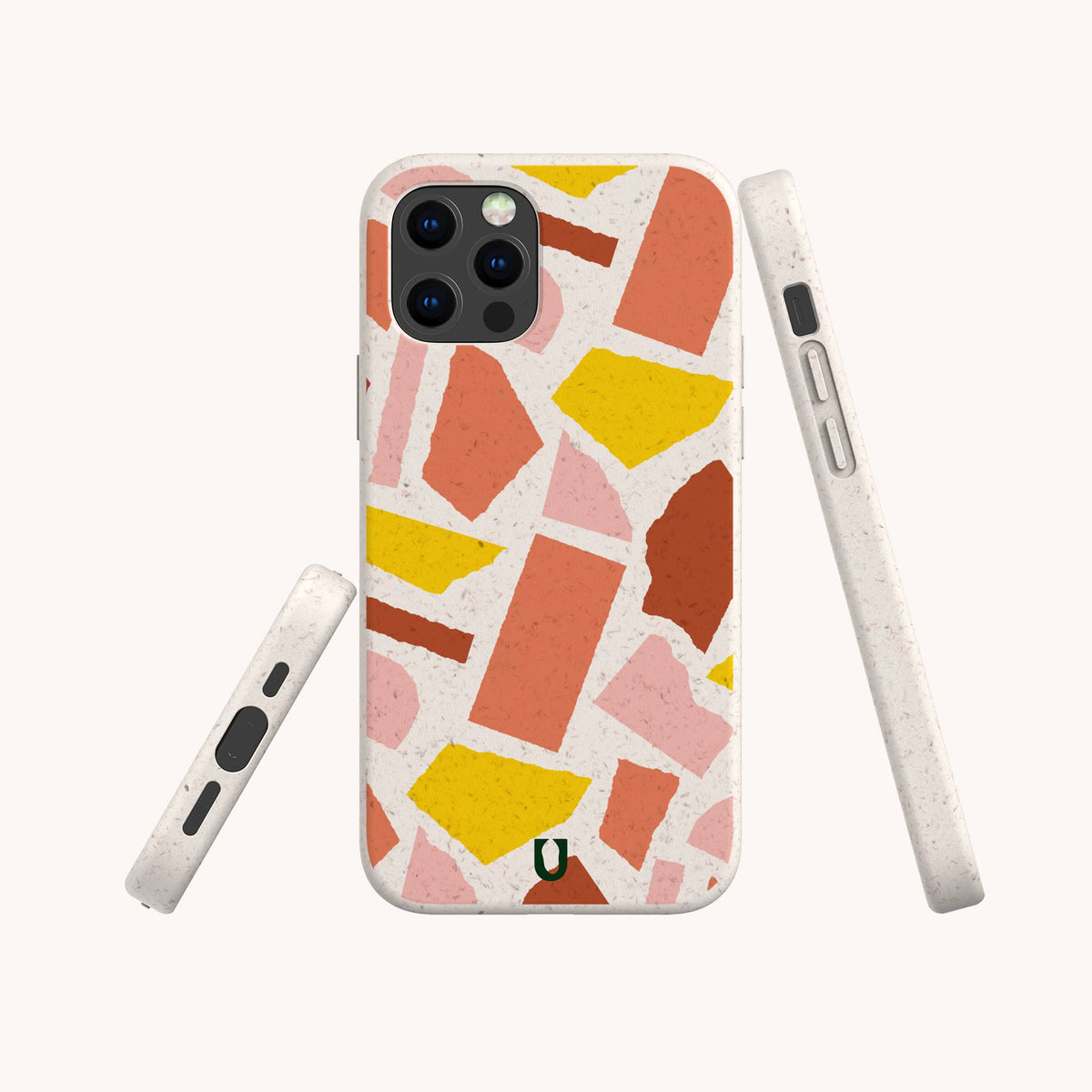 A Paper Scraps Eco-Friendly Biodegradable Phone Case with a terrazzo pattern in pink, yellow, orange, and red shapes on a white background, displayed from the back, side, and front angles.