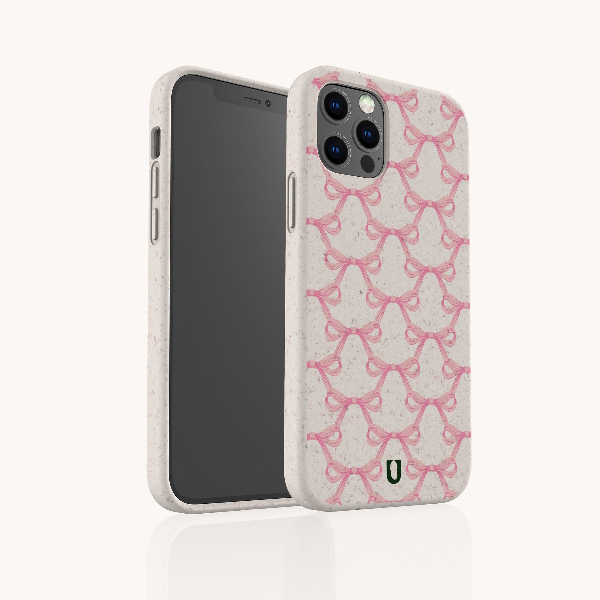 The Pink Bow Ribbons Eco-Friendly Biodegradable Phone Case, in a light color with a repeating pink ribbon pattern, is shown on a smartphone against a plain white background.