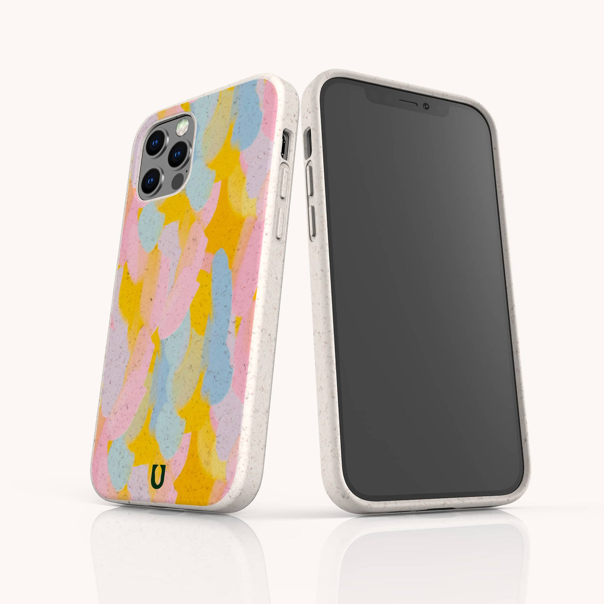 Two smartphones in speckled white cases, one showcasing the vibrant pastel feather design of the Bubble Gum Eco-Friendly Phone Case in pink, yellow, and blue. The other phone is turned to reveal its black screen. This eco-friendly case is perfect for your Samsung Galaxy or iPhone, combining bold style with sustainability.