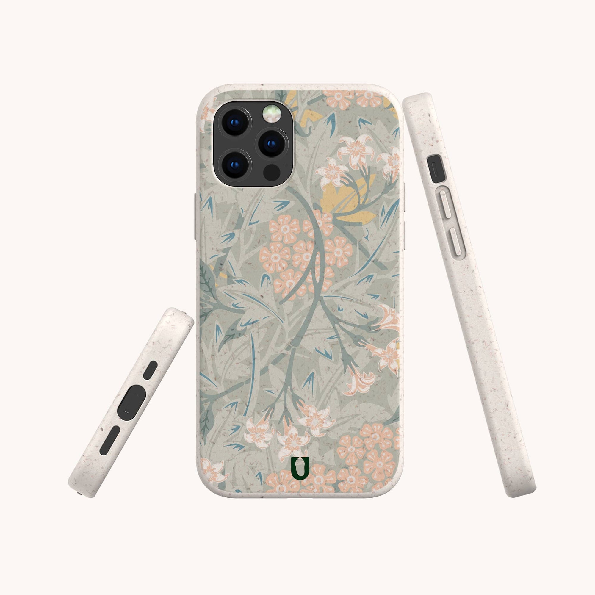 The Jasmine Eco-Friendly Phone Case, made from zero-waste materials, displays pastel floral motifs with delicate pink flowers and green leaves. It is shown from three angles against a plain light background.