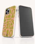 Two smartphones fitted with Funky Shapes Eco-Friendly Biodegradable Phone Cases in pink and green, displayed from both the back and front angles, standing upright against a plain white background.
