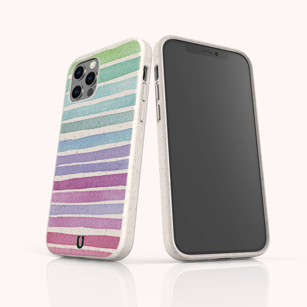 Two smartphones with white speckled, eco-friendly Winter Rainbow phone cases—one showing a pastel rainbow stripe design on the back and the other revealing its front black screen—stand upright against a white background.