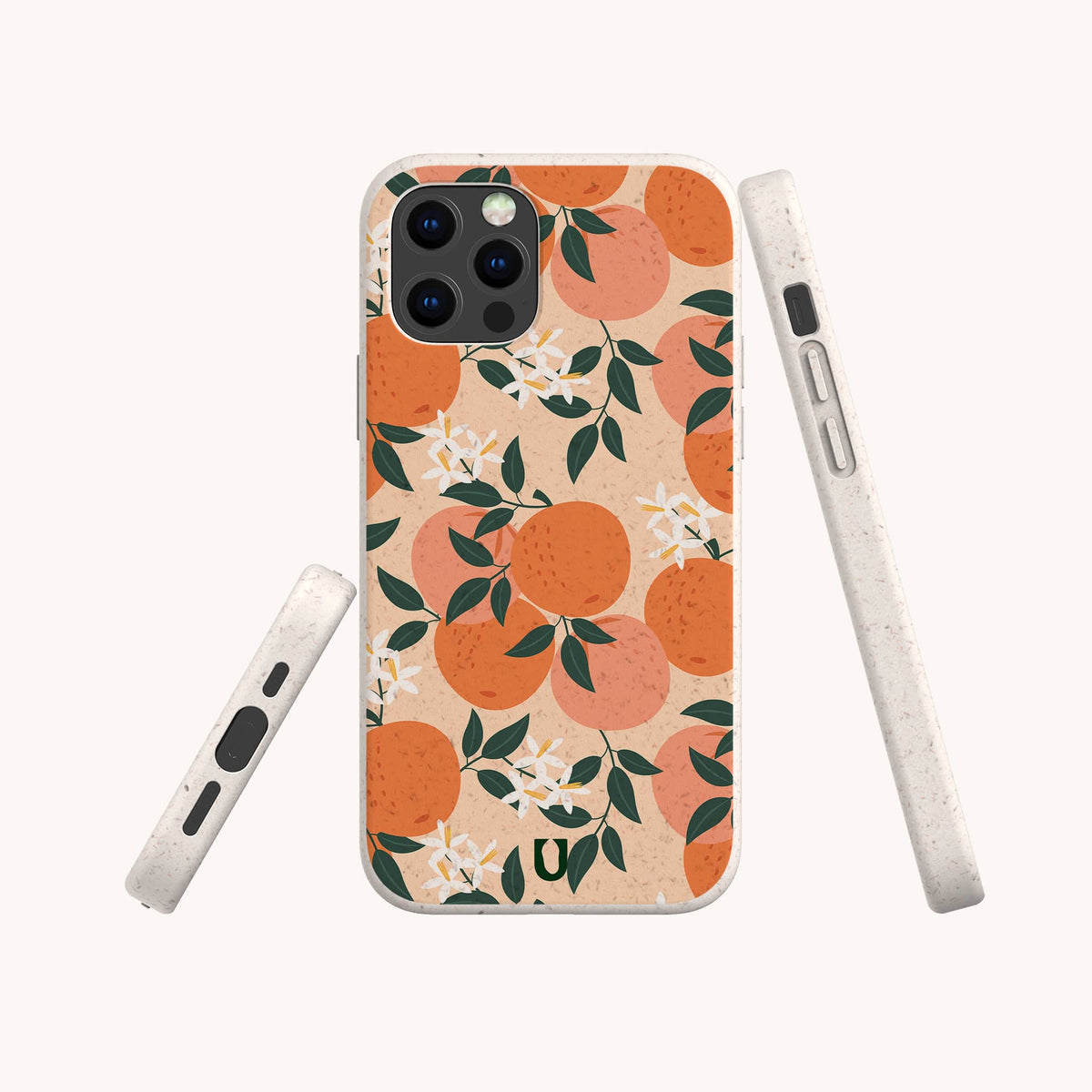 Three views of the Orange Blossom Eco-Friendly Phone Case are shown from the back, side, and bottom. This beige case features an orange fruit and green leaf pattern with white flowers.