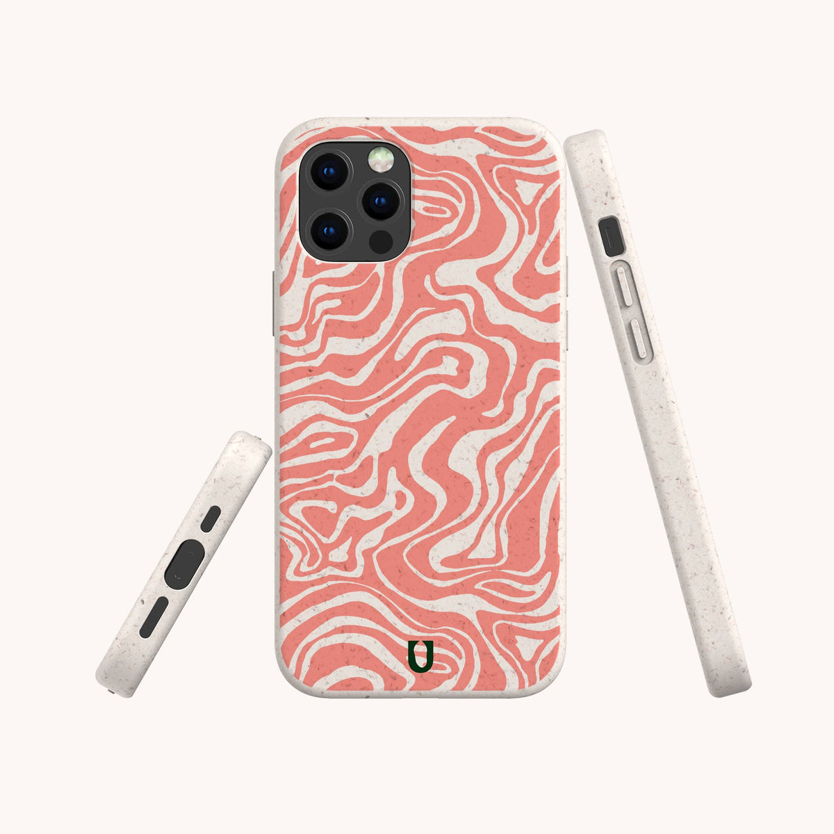 A smartphone is displayed from multiple angles on a plain background, featuring the Pink Marble Swirl Eco-Friendly Phone Case in white and pink with a wavy marble pattern. The biodegradable case has a small black logo at the bottom.
