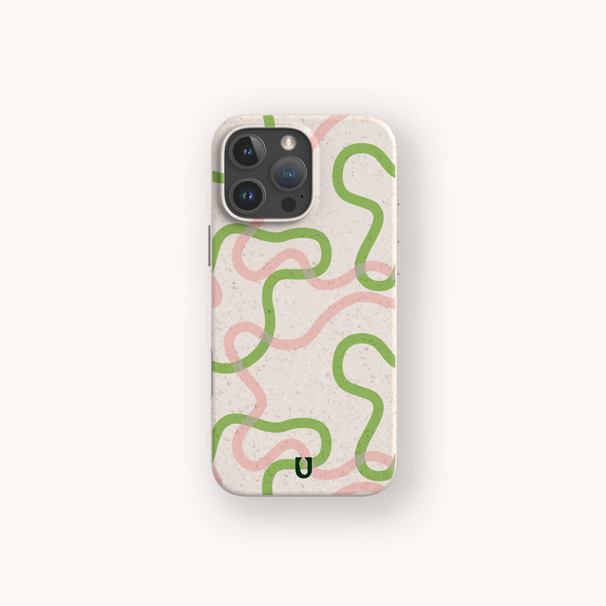 The Green and Pink Swirl Lines Eco-Friendly Phone Case, shown in beige with wavy green and pink lines and a small black U-shaped mark near the bottom, is displayed on a light background. This sustainable phone case is compatible with both iPhone and Samsung Galaxy models.