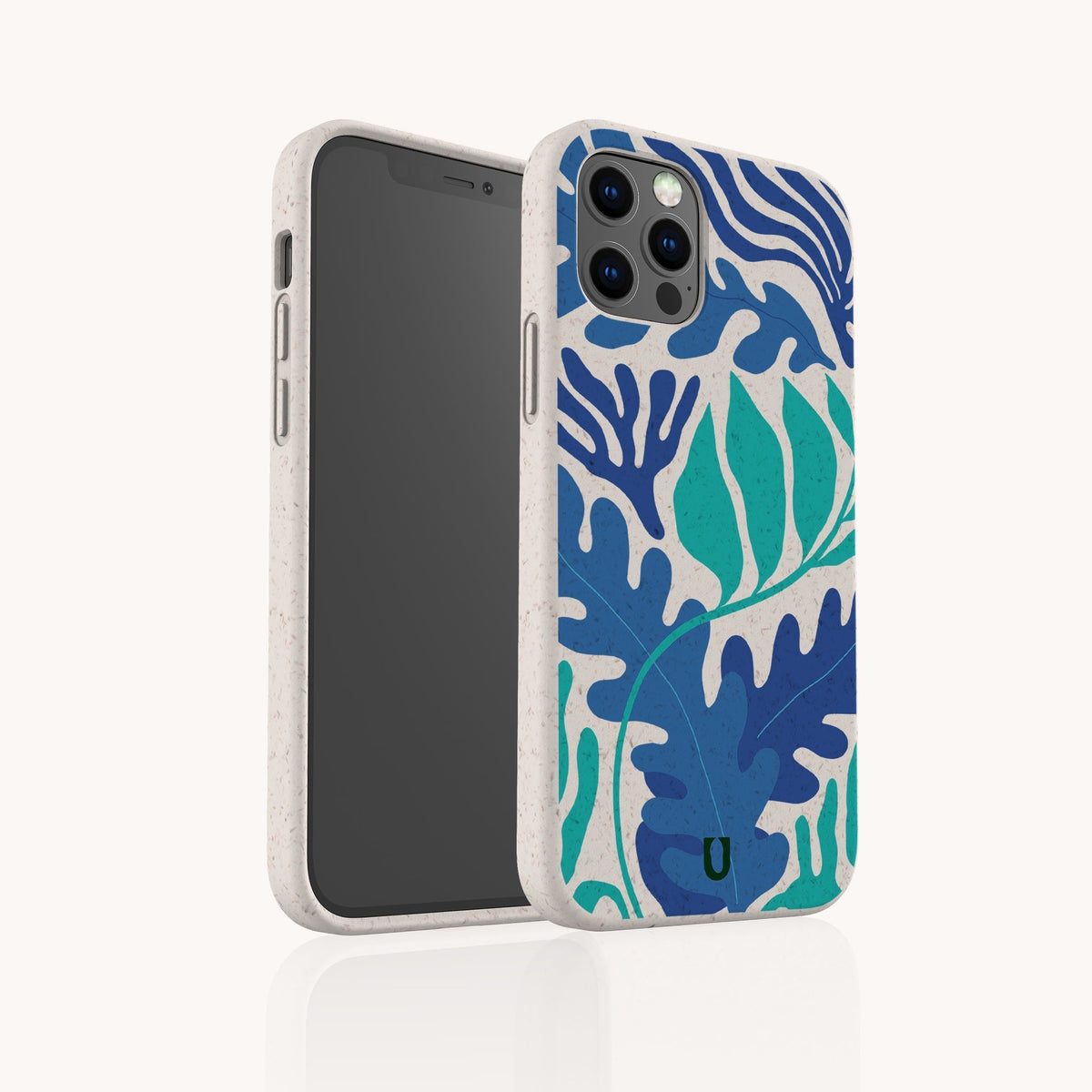 A smartphone in the Sea Bed Eco-Friendly Phone Case, featuring blue and green abstract leaf patterns, stands upright and slightly angled to display both its screen and the distinctive decorative back.