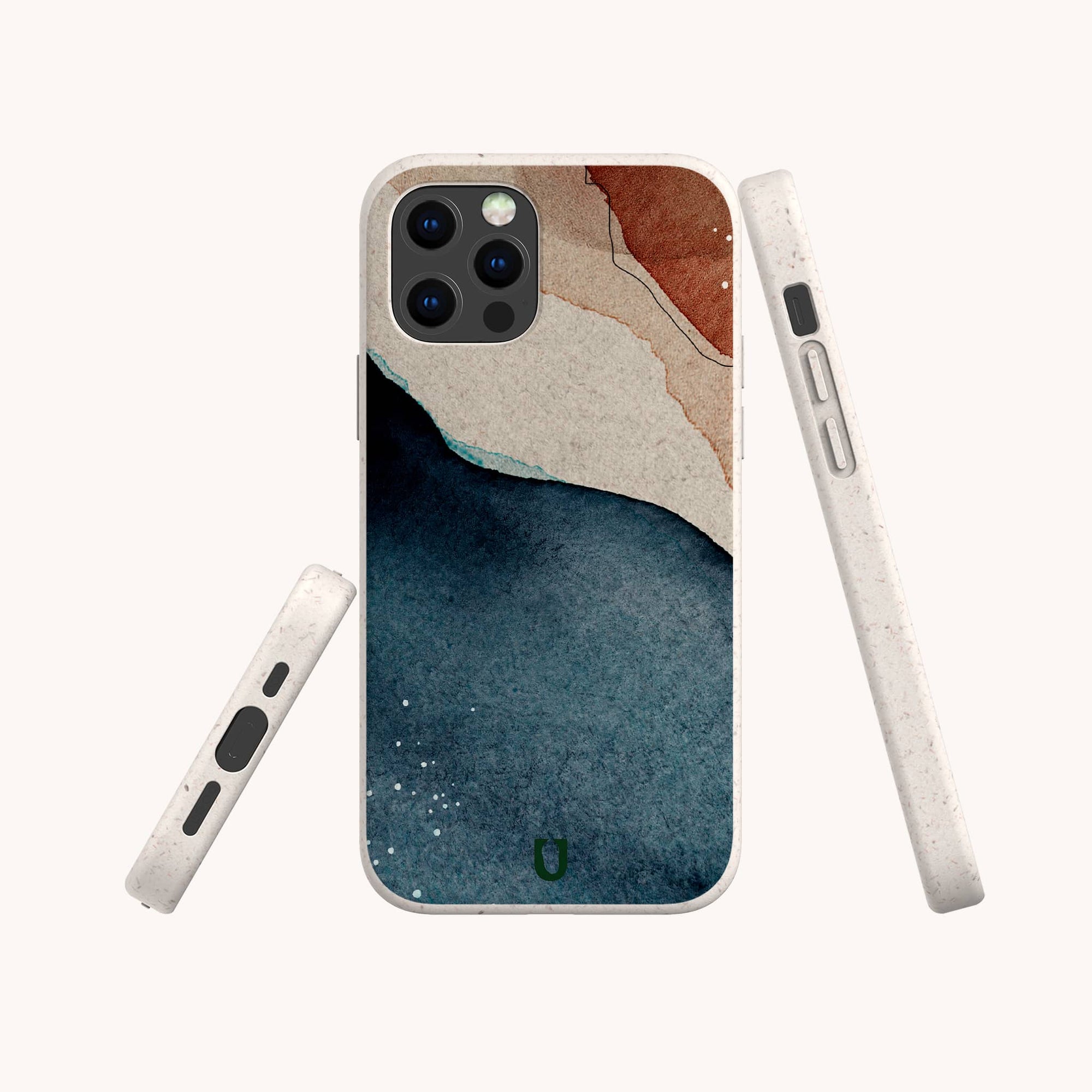 The Watercolour Landscape Eco-Friendly Phone Case features an abstract navy blue, beige, and rust design. It is compostable and is shown from the back, side, and bottom angles on a light background.