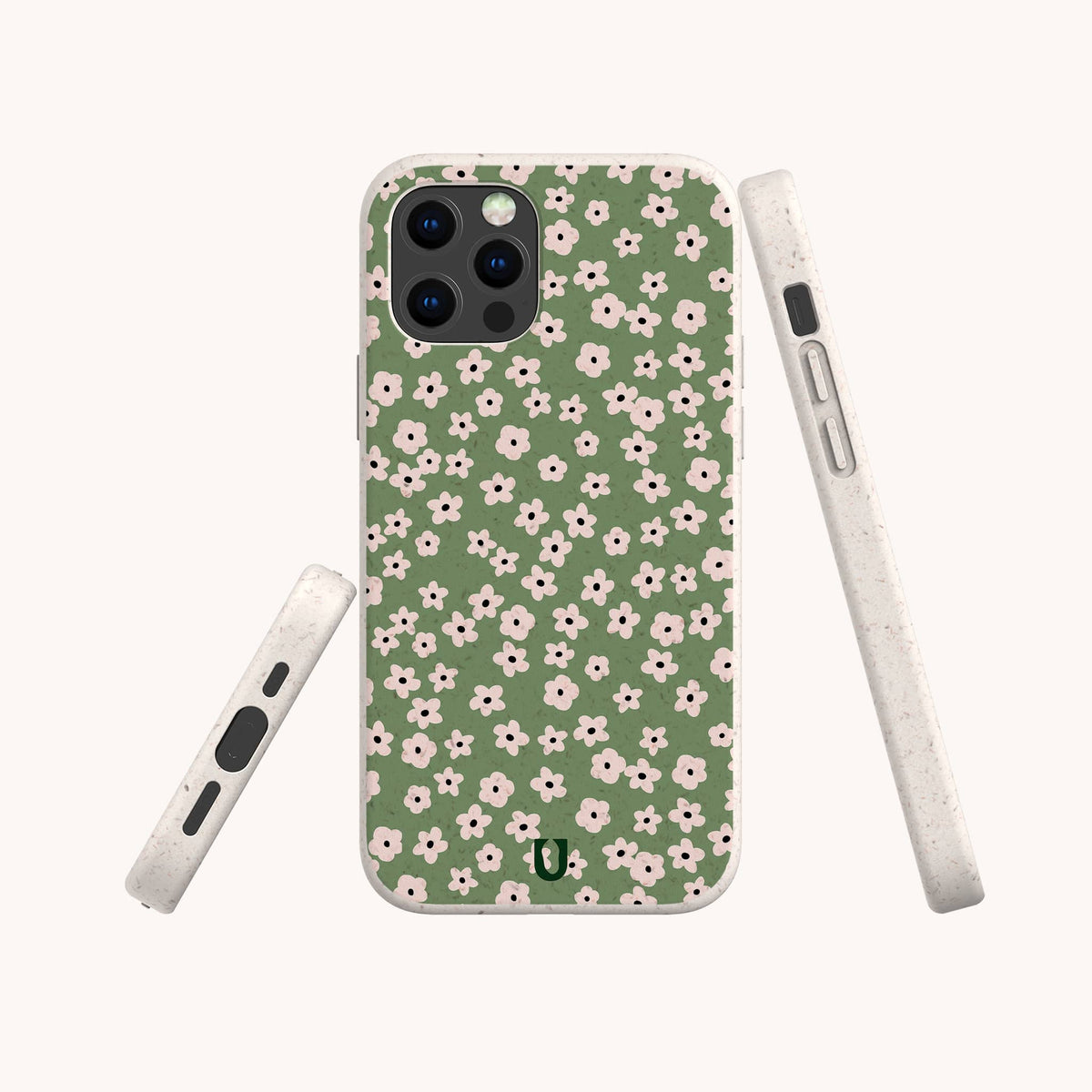 The Vintage Green Flowers Eco-Friendly Phone Case showcases a charming green background with a delicate pink and white floral pattern, displayed from the back, side, and angled views against a simple light backdrop.