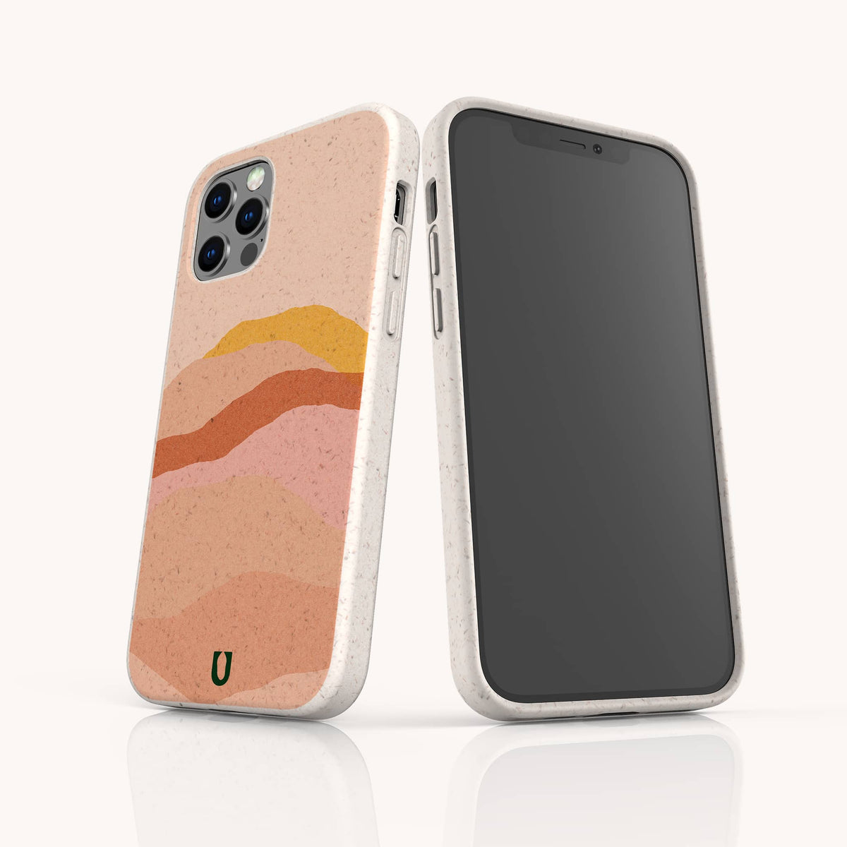 Two smartphones in light beige speckled Hills Eco-Friendly Phone Cases; one displays the screen, while the other showcases a case design featuring abstract wavy lines in pink, orange, and peach tones. A small green horseshoe logo at the bottom highlights its eco-friendly construction.