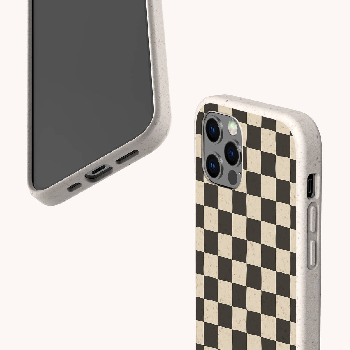 Two smartphones with beige-speckled cases; one showcases the Black Checker Eco-Friendly Phone Case, featuring a bold black-and-beige checkerboard design on the back, while the other shows its front screen and charging port. Both provide an eco-friendly option for sustainable style.