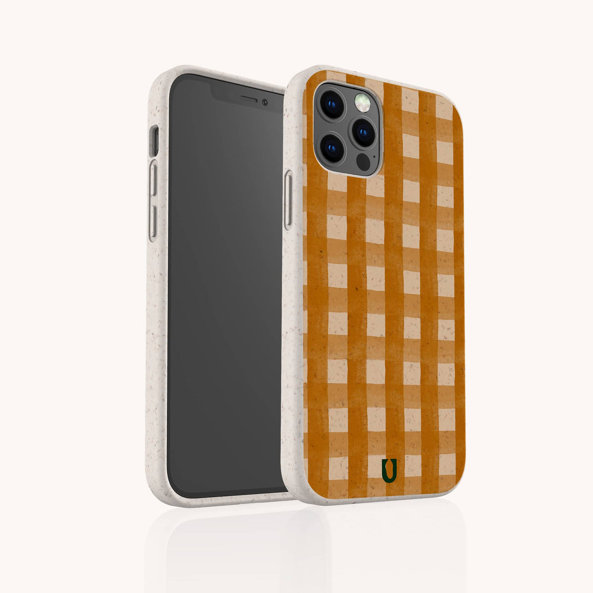 The image displays a smartphone encased in the Terracotta Watercolour Gingham Eco-Friendly Phone Case, which features a sustainably designed back with an orange and white gingham pattern inspired by terracotta watercolours, showcasing both the front screen and the stylish patterned case.