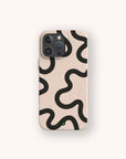 A smartphone with the Black Swirl Lines Eco-Friendly Phone Case in beige, featuring black wavy abstract lines, is centered on a plain light background.