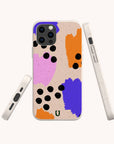 Three views of the Memphis Eco-Friendly Biodegradable Phone Case featuring abstract patterns in orange, purple, and pink, accented with black dots on a speckled beige background. This phone case combines stylish Memphis design with sustainable, biodegradable materials.