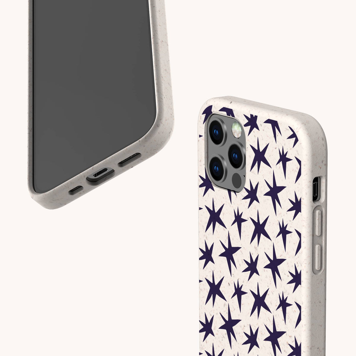 Two beige phone cases are shown. One, the Wonky Stars Biodegradable Phone Case, features a dark star pattern on the back, while the other displays its front and bottom sides, highlighting cutouts for the charging port, speakers, and side buttons.