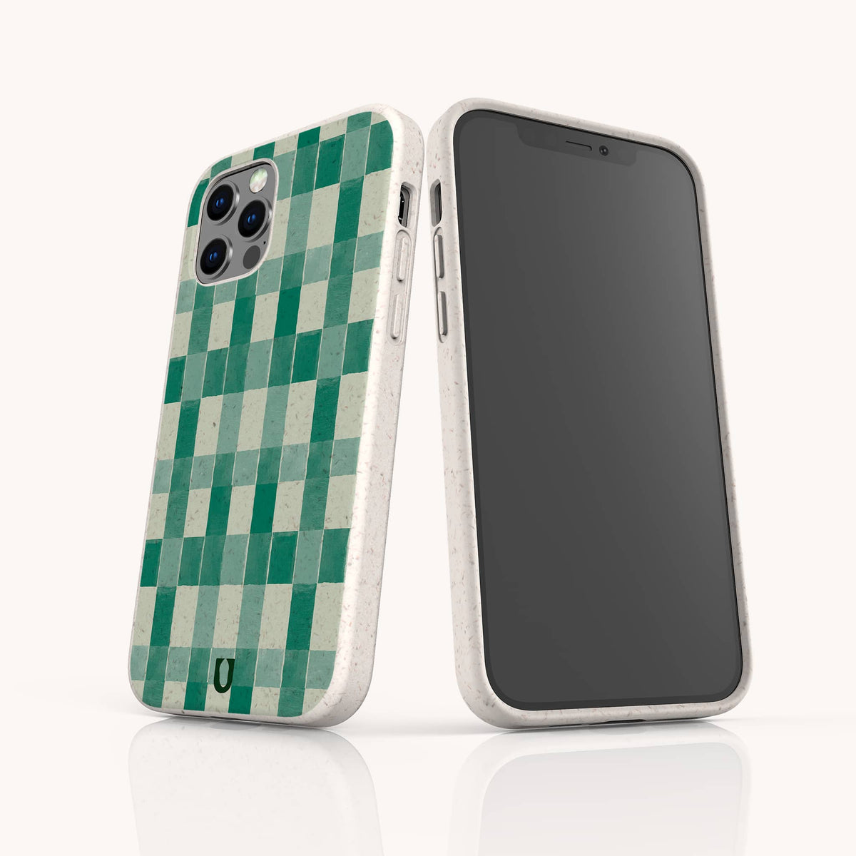 Two smartphones in white cases featuring a green watercolor checker pattern on the back, displayed from both front and back angles on a plain white backdrop. These eco-friendly Green Watercolour Checker phone cases are compatible with both iPhone and Samsung Galaxy models.
