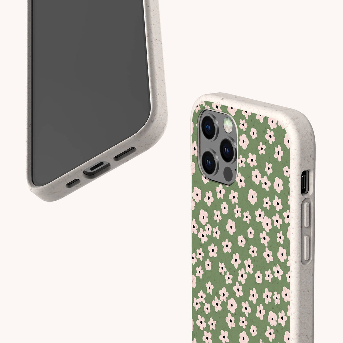 Two smartphones in beige cases: one displays the screen and ports, while the other shows the back featuring the Vintage Green Flowers Eco-Friendly Phone Case with a green vintage floral design of small pink flowers and precise camera cutouts.