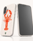 Two smartphones with white Aragosta Eco-Friendly Biodegradable Phone Cases; one case showcases a red lobster illustration. The phones are standing upright—one displays the compostable case design, while the other reveals the screen.