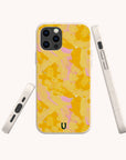Four views of a smartphone with the Papaya Eco-Friendly Biodegradable Phone Case, featuring a yellow and pink abstract pattern and a white frame, displayed on a light background. This eco-friendly case includes a small horseshoe logo at the bottom.