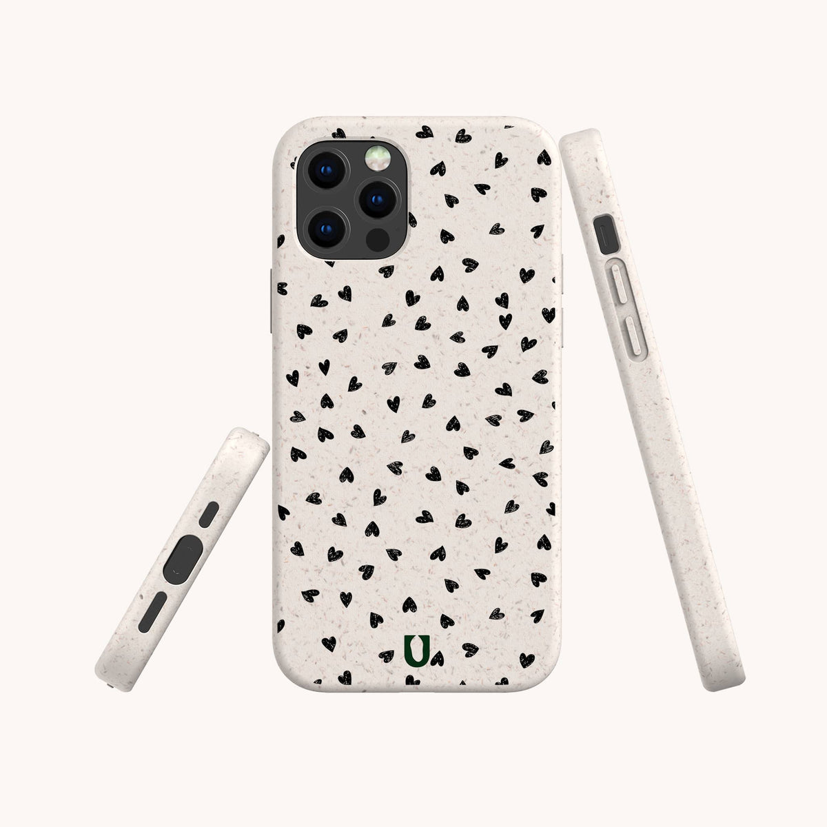 Three views of the Black Hearts Eco-Friendly Phone Case with a white background and small black heart pattern, featuring precise openings for the camera and buttons. The lower back displays a small green “u” logo.