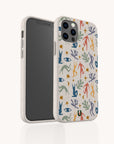 Two smartphones in vibrant Joie de Vivre Eco-Friendly Phone Cases, featuring colorful abstract figures, hands, eyes, stars, and plants on a beige background. One phone faces forward while the other displays the back design—each showcasing an artistic case that brings a unique and eco-conscious flair to your device.