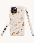 Three angles of the Summer Jam Eco-Friendly Phone Case in beige, adorned with brown tropical doodles like palm trees, shells, flip-flops, sunglasses, and cocktails. This sustainable phone case offers precise cutouts for buttons, camera, and charging port.