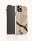 The Beige Abstract Eco-Friendly Phone Case, made from biodegradable materials with brown, tan, and black shapes, is shown on a smartphone from front and back against a white background. Compatible with iPhone and Samsung Galaxy.