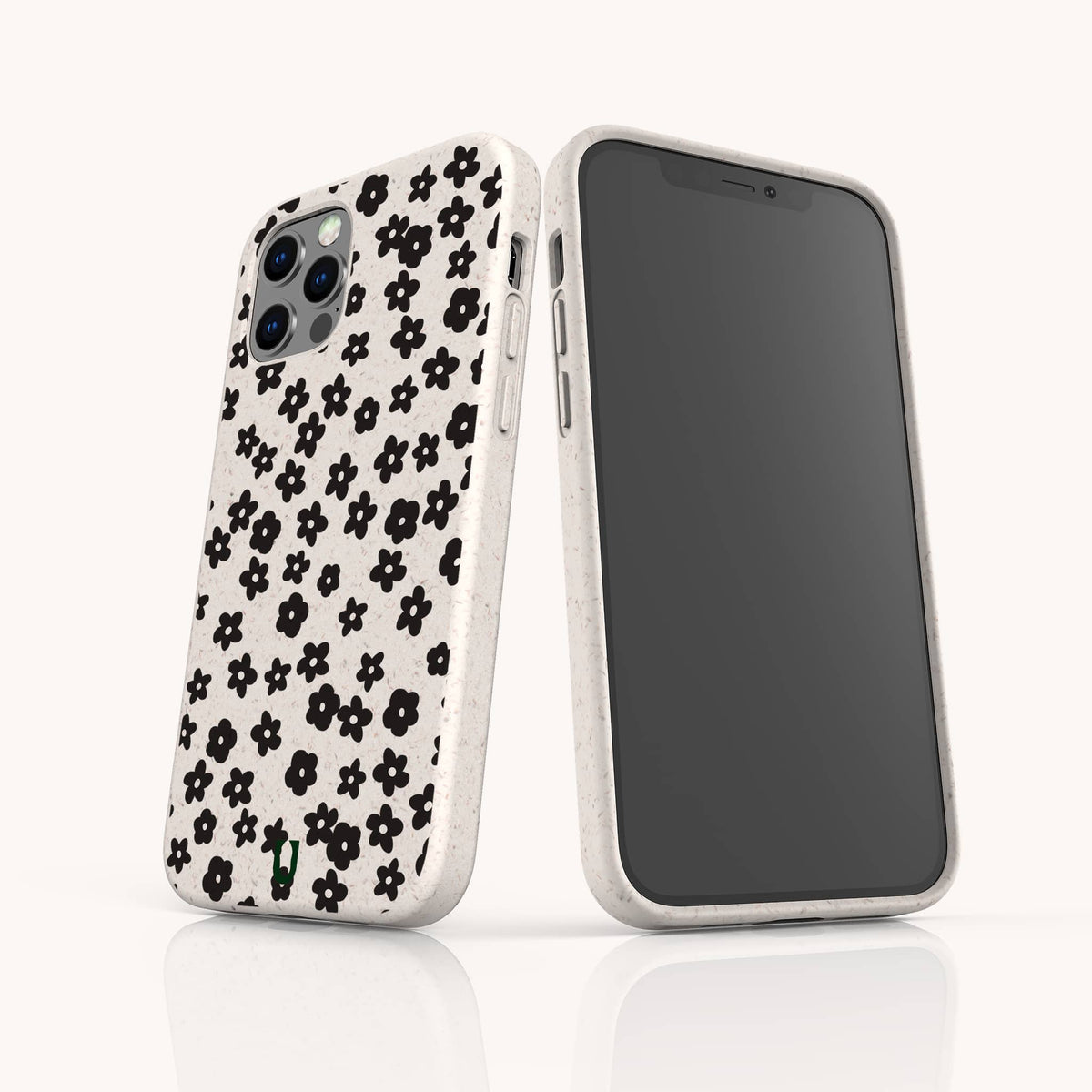 Two Little Black Flowers Eco-Friendly Biodegradable Phone Cases, each in a white finish adorned with an elegant black floral pattern, are displayed upright from both back and front angles against a simple, light backdrop. Crafted from sustainable materials, these cases offer a stylish design you can feel good about.