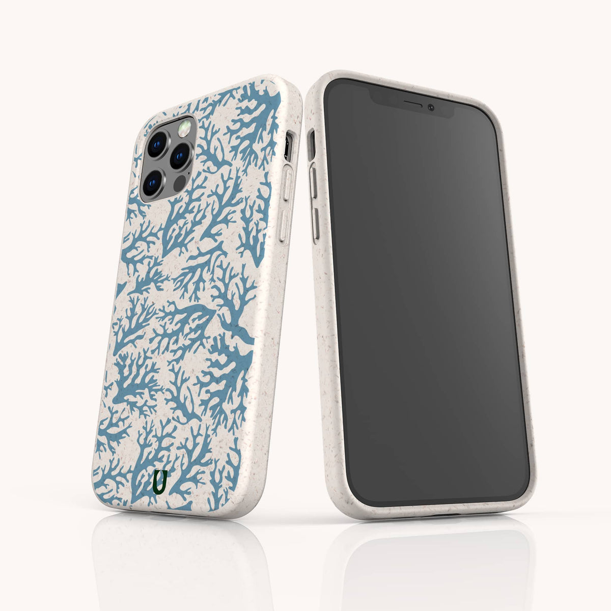 Two smartphones in Blue Coral Eco-Friendly Phone Cases: one phone faces forward to show the screen, while the other is angled to highlight the marine-inspired pattern and cover the camera area.