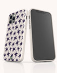 Two smartphones with white Wonky Stars Biodegradable Phone Cases featuring a pattern of dark blue stars. One phone displays the back design, while the other shows the front screen. Both are standing on a white surface.