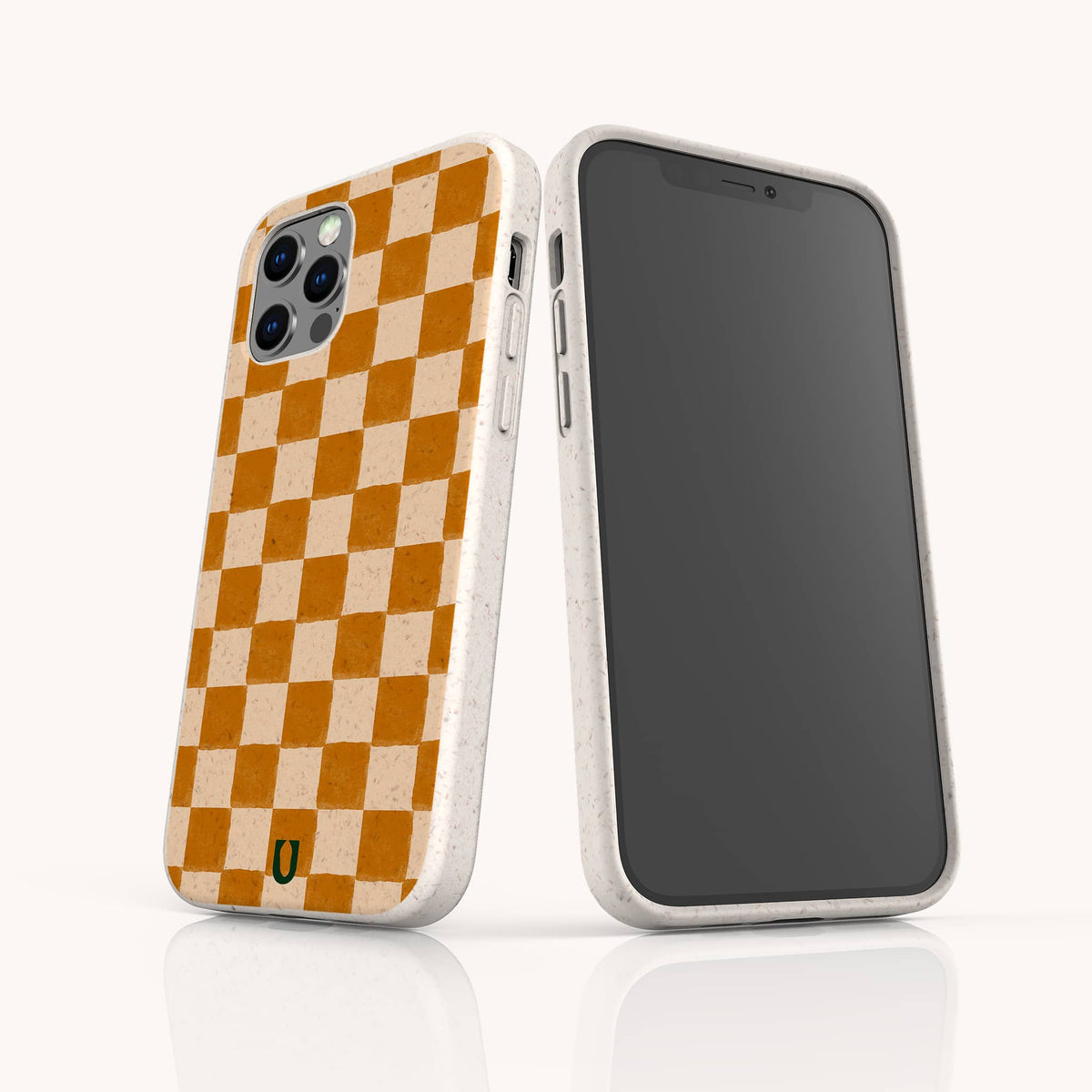 Two smartphones in beige cases with a brown checkerboard pattern on the back. One phone displays the distinctive Brown Checker Eco-Friendly Phone Case design, while the other shows the front screen. These eco-friendly cases combine stylish brown checkers with sustainable protection for your device.