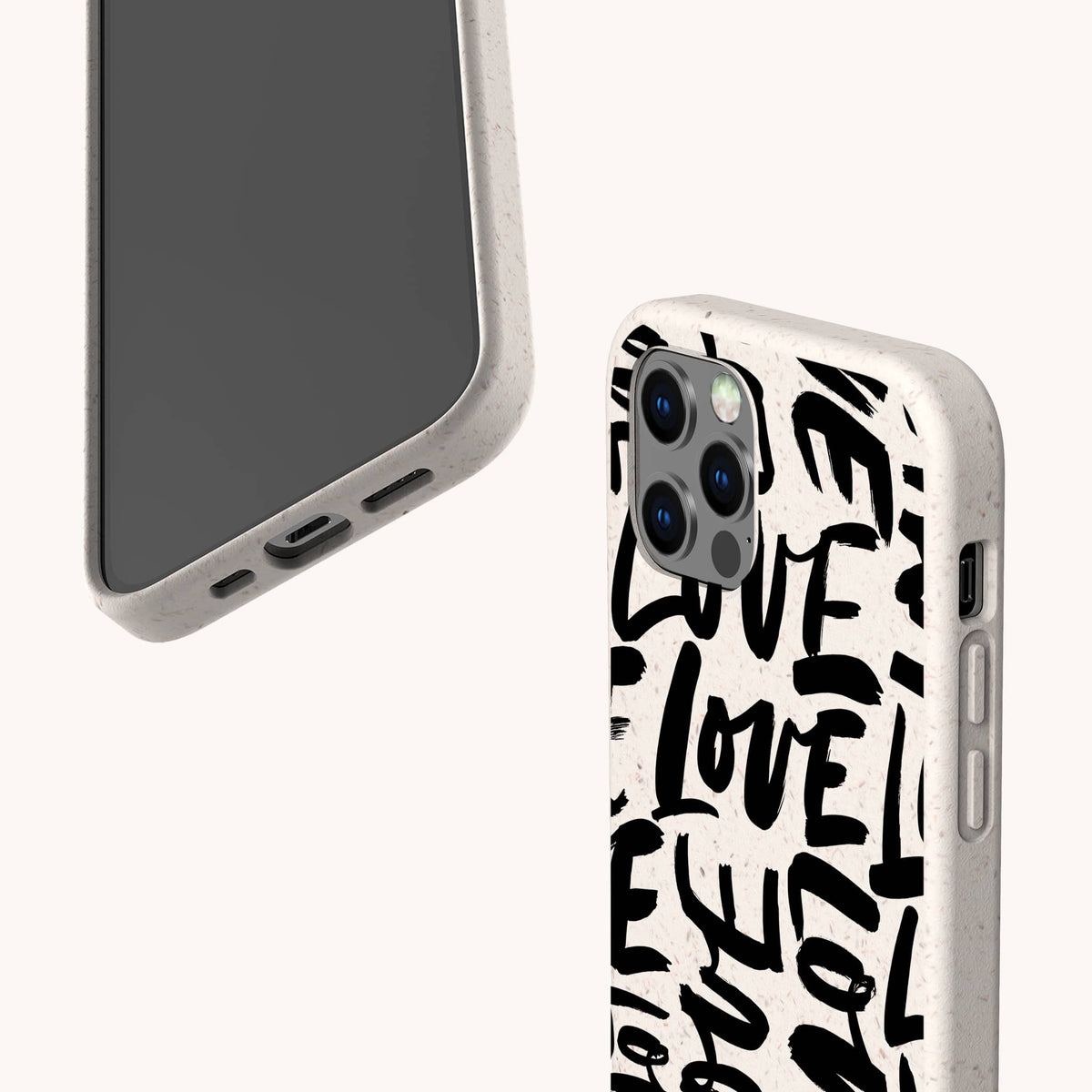 Two smartphones in white Love Words Eco-Friendly Biodegradable Phone Cases feature a bold, black handwritten “LOVE” text pattern. One phone displays its screen, while the other showcases the speckled-textured back and camera. Both eco-conscious cases combine stylish design with environmental responsibility.