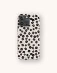 Little Black Flowers biodegradable phone case on iPhone 17 featuring delicate black floral pattern and matte eco-friendly finish.